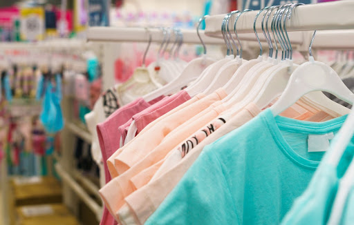 A rack of t-shirts at a Winmark franchise 